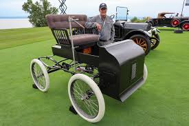 Vintage sepia-toned image of a futuristic hatchback with earth-toned curves and integrated greenery